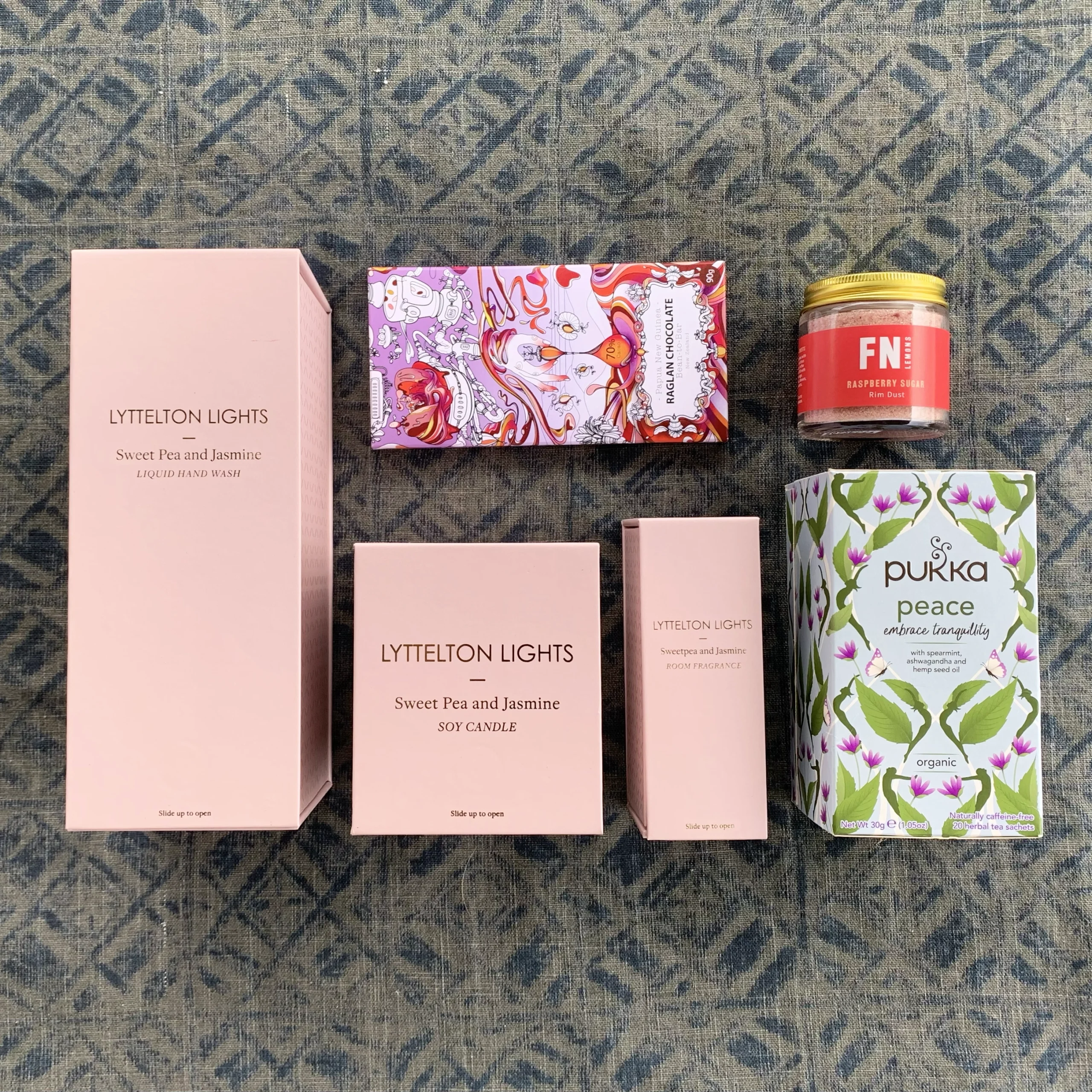 Just because gift box contains sweet pea hand wash, candle and room spray, raglan chocolate bar, jar of rim duster and a box of pukka tea